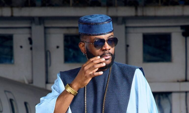 Ebuka Obi-Uchendu Paired a Sky-Blue Tunic With a Pleated Chevron Skirt on Big Brother Naija